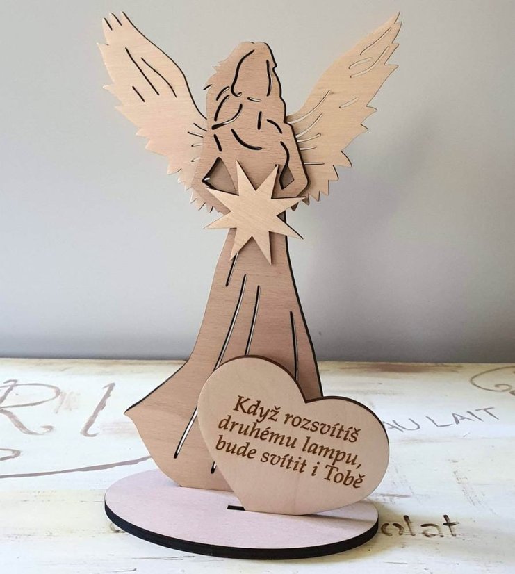 Anjel s citátom Keď zapáliš lampu iného